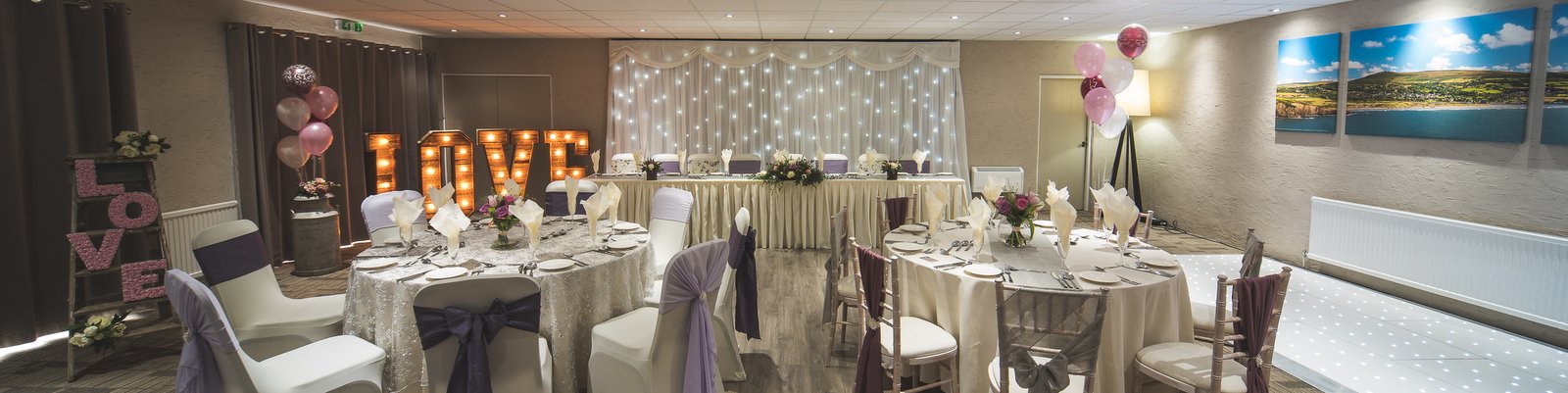 Function room dressed for a wedding reception